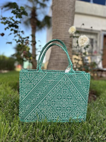 Gree embroidered handbag with intricate Fassi patterns, featuring sturdy top handles and a black suede interior